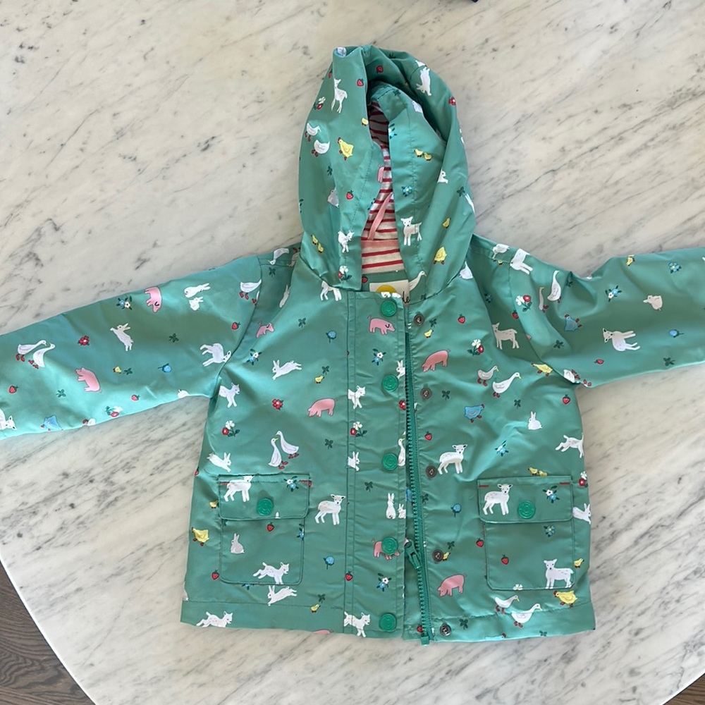 Mini Boden unisex rain jacket, 12-18 months. Green with cute farm animals.